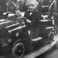 Margaret, aged around 6, on a fairground ride, c. 1930, Nosher's Family History - 1880-1955