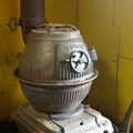 A wood-burner keeps everything warm , Wavy and the Milking Room, Dairy Farm, Thrandeston, Suffolk - 28th March 2005