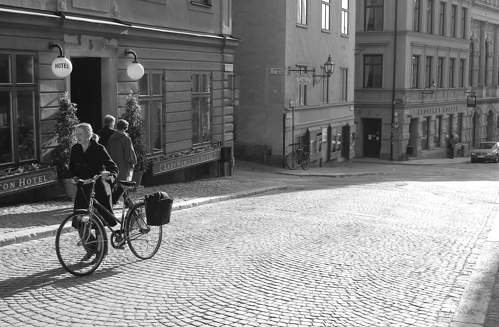 Pushing a bike uphill by the Lady Hamilton Hotel from A Postcard From Stockholm: A Working Trip to Sweden - 24th April 2005
