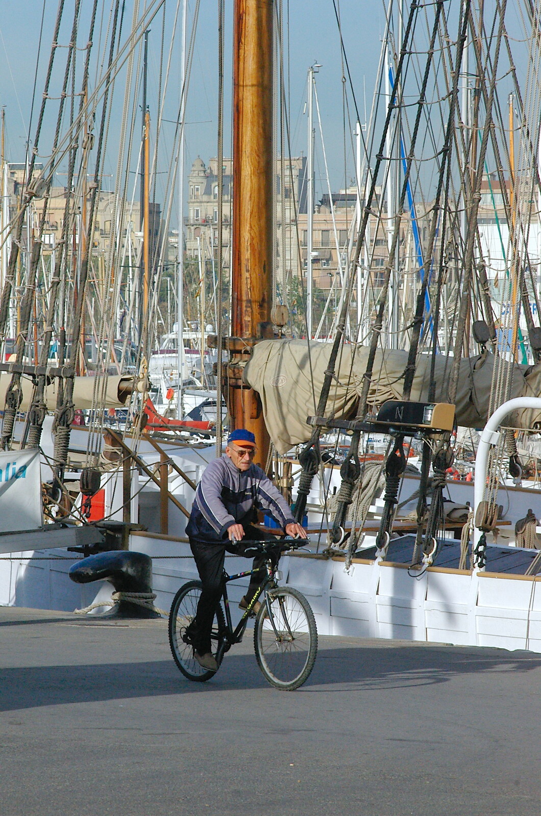 A bloke on a bike down by the harbour from A Trip to Barcelona, Catalunya, Spain - 29th April 2005
