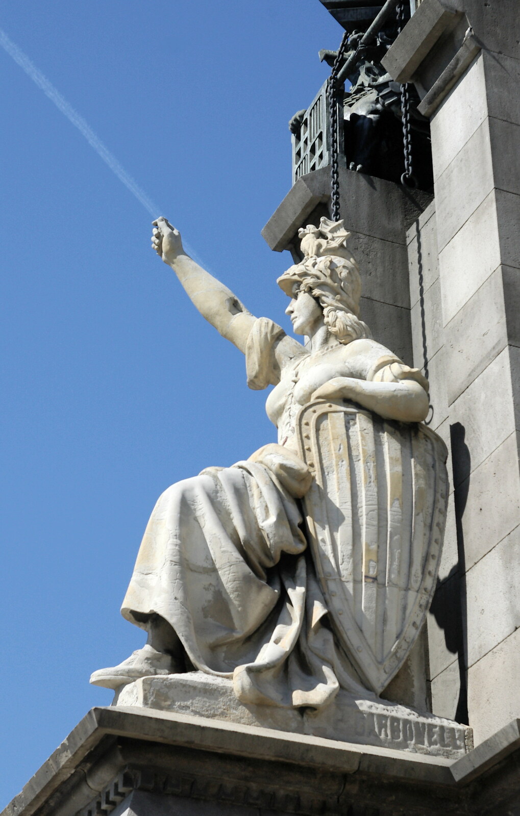 A statue is throwing a contrail javelin from Montjuïc and Sant Feliu de Guíxols, Barcelona, Catalunya - 30th April 2005