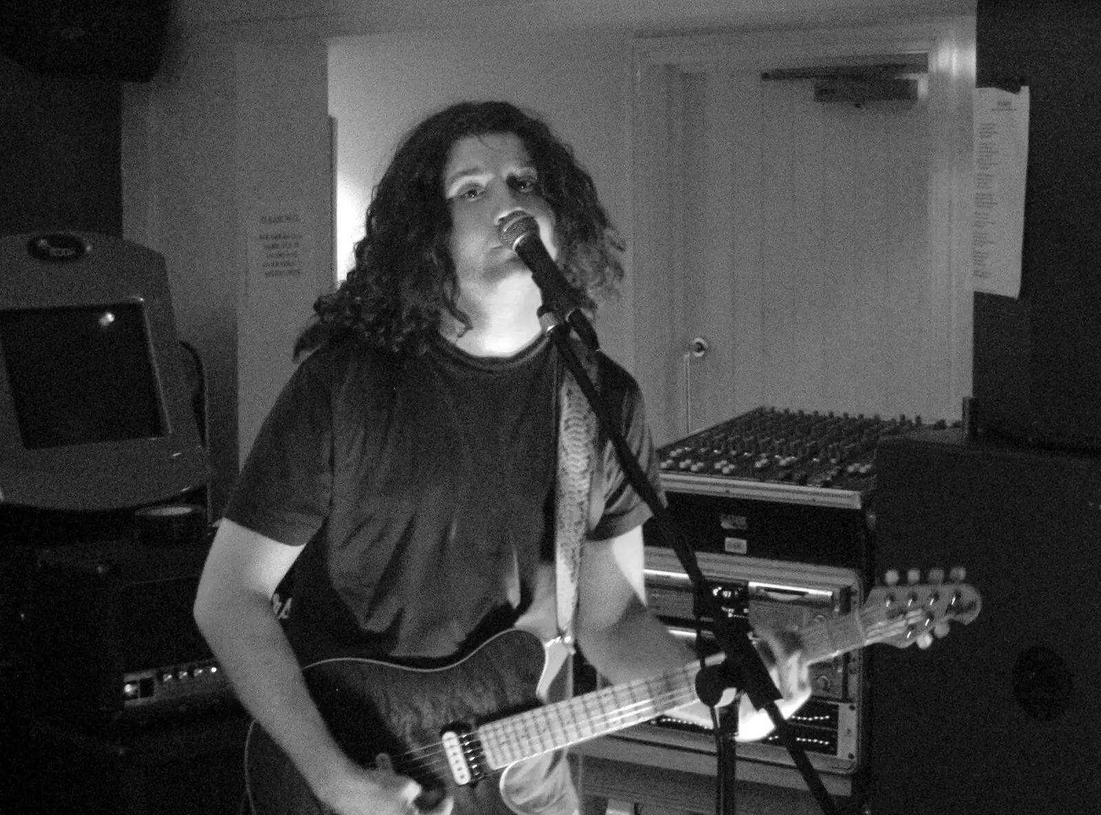 The guitar player looks all wistful, from Music at the Waterfront and Upstairs at Revolution Records, Diss - 8th May 2005