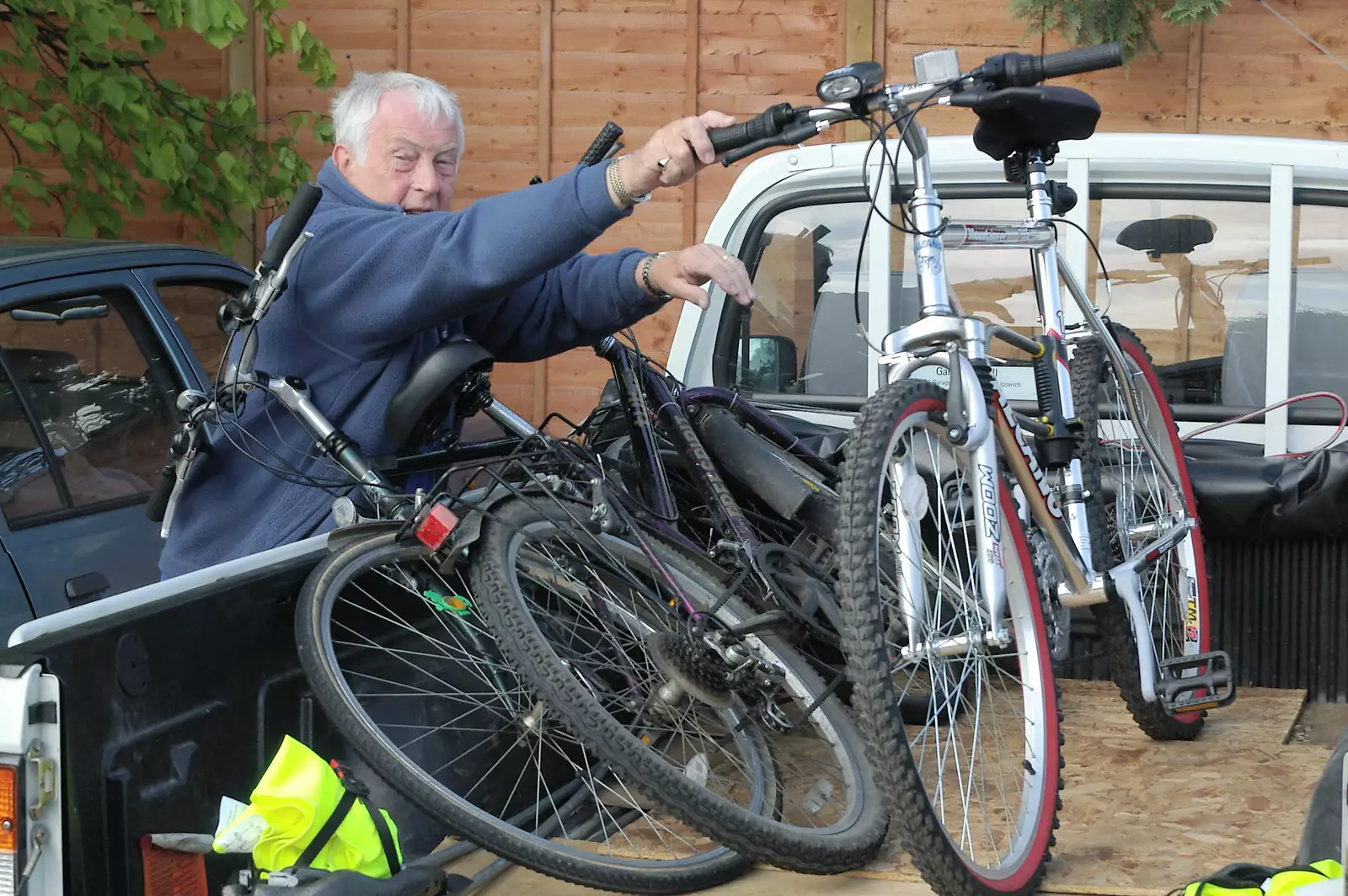 Colin hauls some bikes out of his pickup, from The BSCC Weekend Trip to Rutland Water, Empingham, Rutland - 14th May 2005