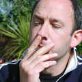 DH gets a liquorice-paper roll-up on the go, The BSCC Weekend Trip to Rutland Water, Empingham, Rutland - 14th May 2005