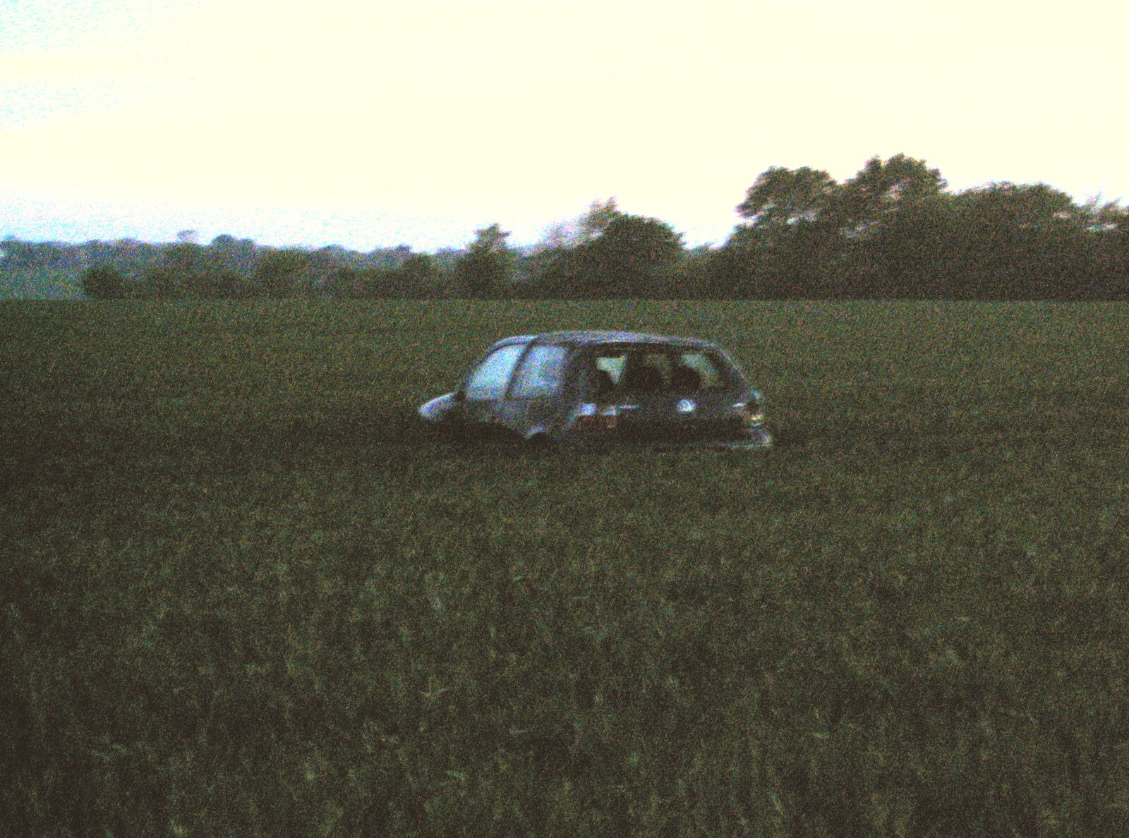 There's a VW Golf in a field of wheat from BSCC Bike Rides and Fun With Diffraction Gratings, Gissing and Diss - 26th May 2005