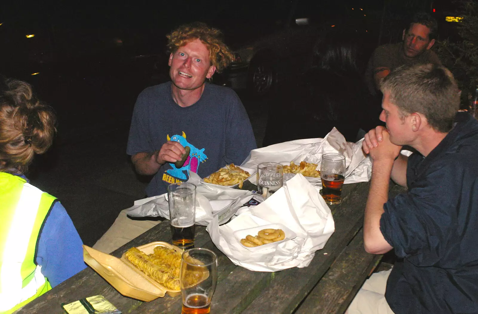 Wavy gets the chips in outside the Cock Inn, from BSCC Bike Rides and Fun With Diffraction Gratings, Gissing and Diss - 26th May 2005