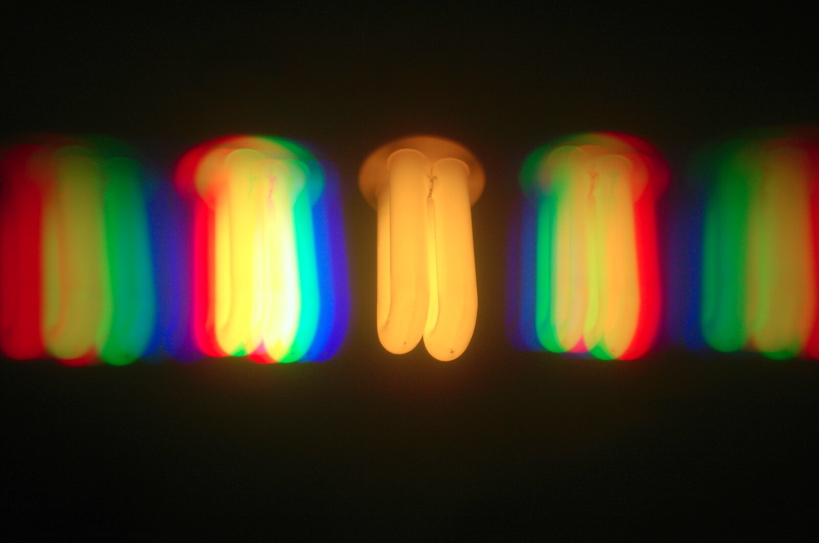 A CFL bulb through a diffraction grating from BSCC Bike Rides and Fun With Diffraction Gratings, Gissing and Diss - 26th May 2005