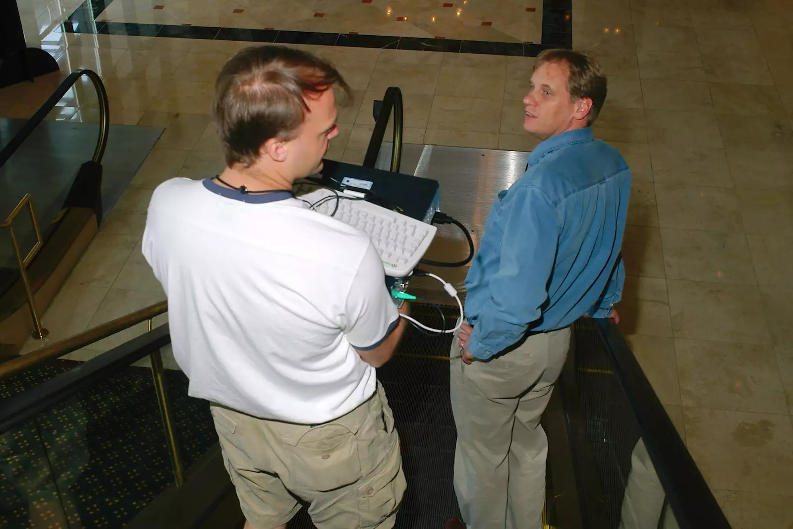 Nick and Luke on the escalator, from The BREW Developers Conference, San Diego, California - 2nd June 2005