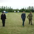 The gang walk to the hangars, A 1940s VE Dance At Debach Airfield, Debach, Suffolk - 11th June 2005