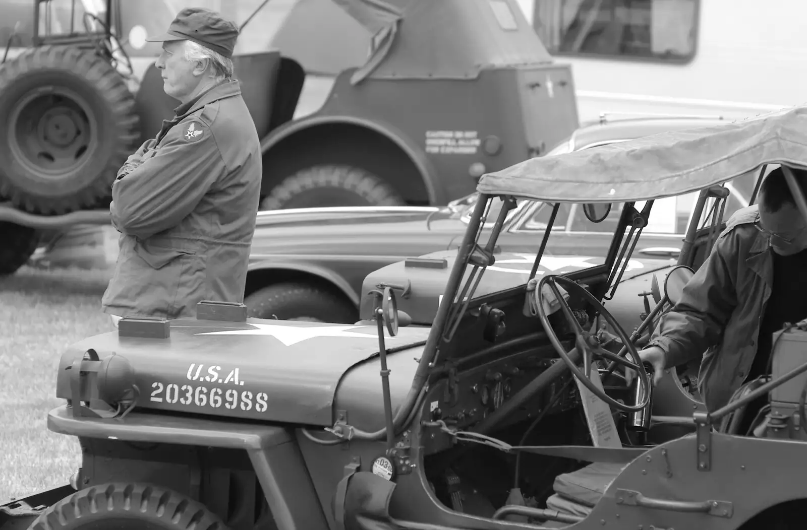 A dude stands by his Willys jeep, from An Airfield Open Day, Debach, Suffolk - 12th June 2005