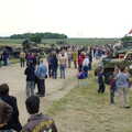 The crowds watch Maurice Hammond's fly-by in Janie, An Airfield Open Day, Debach, Suffolk - 12th June 2005