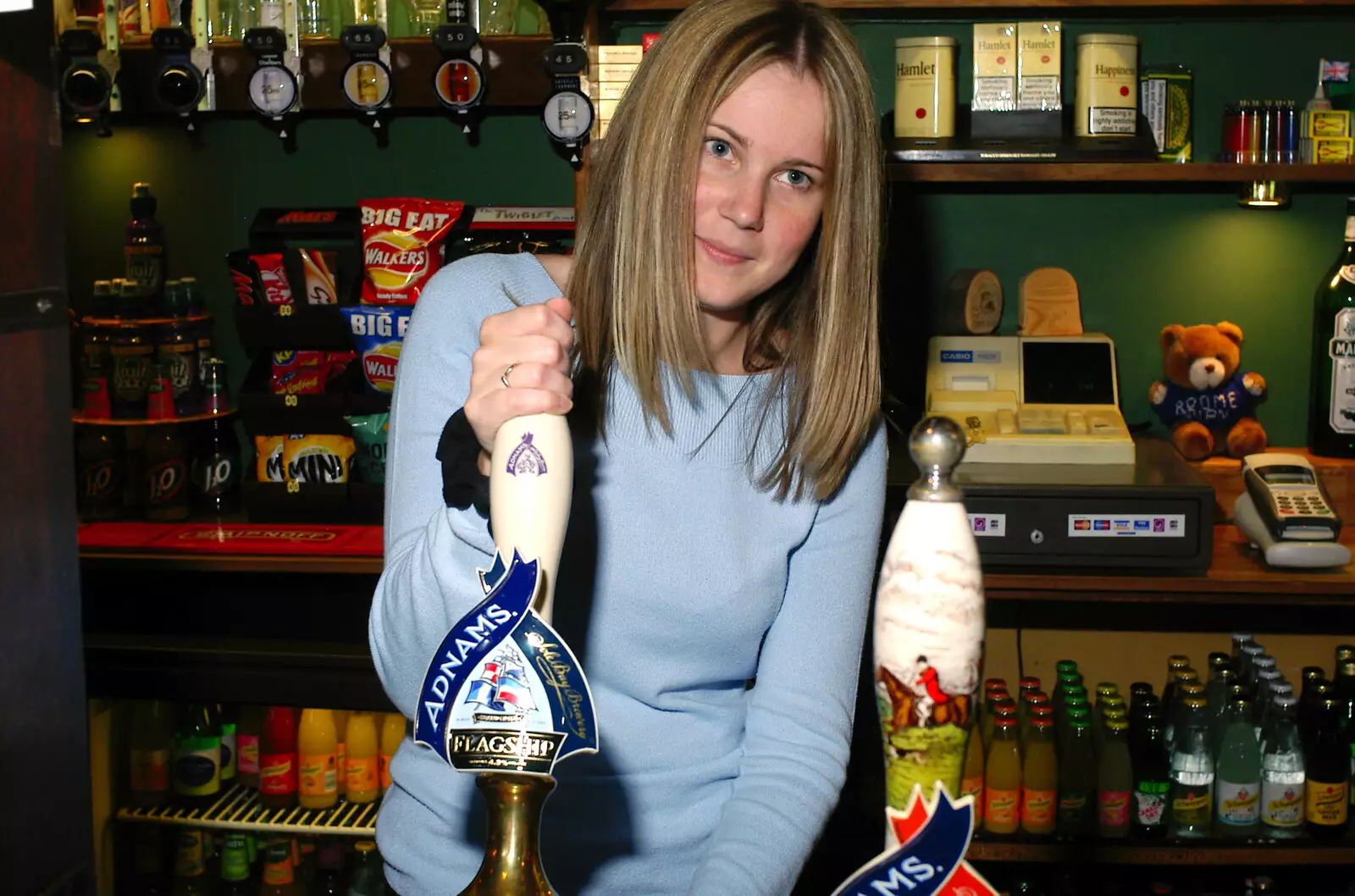 Lorraine pulls a pint, from A BSCC Bike Ride and an Indoor Barbeque at the Swan, Tibenham and Brome - 16th June 2005