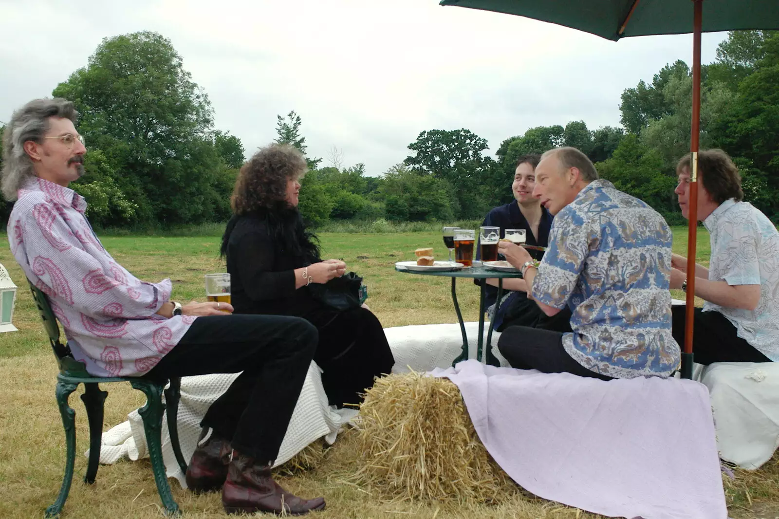 The band chats in a field, from The BBs do a Wedding Gig at Syleham, Suffolk - 25th June 2005