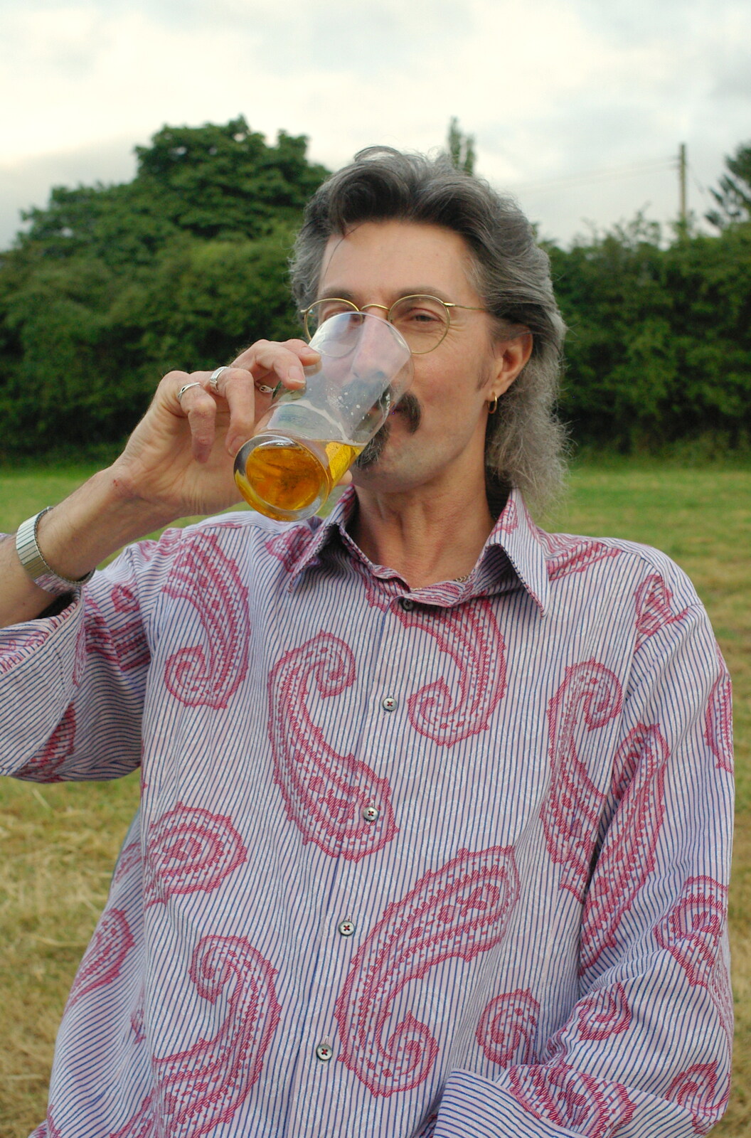 Rob has a swig from The BBs do a Wedding Gig at Syleham, Suffolk - 25th June 2005