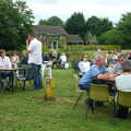 The scene on Thrandeston Little Green, A Combine Harvester and the Pig Roast, Thrandeston, Suffolk - 26th June 2005