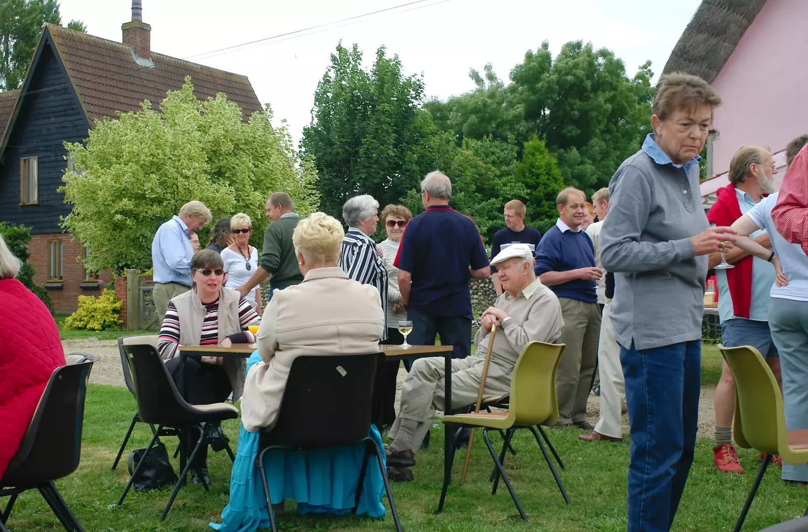 Tables out on the village green, from A Combine Harvester and the Pig Roast, Thrandeston, Suffolk - 26th June 2005