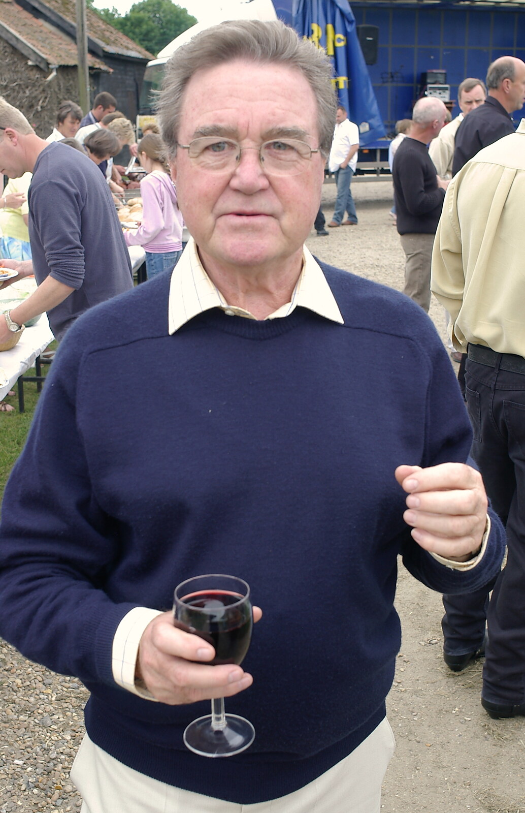 Peter Allen with a glass of red wine from A Combine Harvester and the Pig Roast, Thrandeston, Suffolk - 26th June 2005