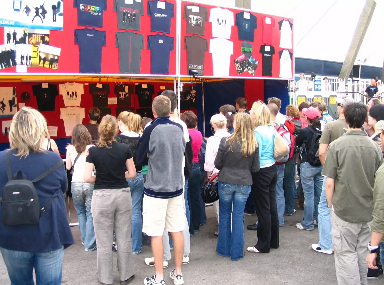 Suey and Phil queue up for merchandise gouging, from Coldplay Live at Crystal Palace, Diss Publishing and Molluscs, Diss and London - 28th June 2005