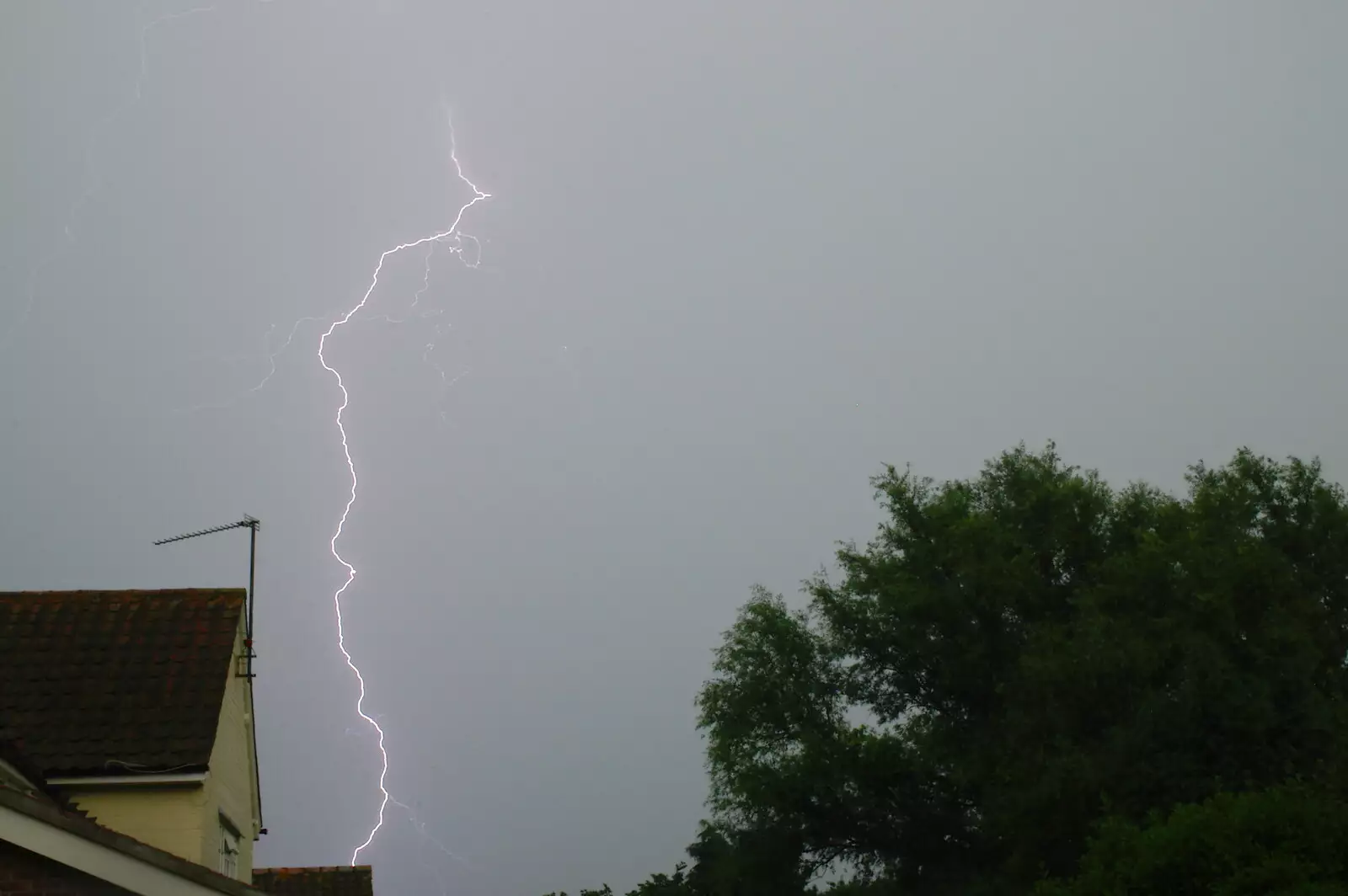 The bad weather continues with lightning at home, from Coldplay Live at Crystal Palace, Diss Publishing and Molluscs, Diss and London - 28th June 2005