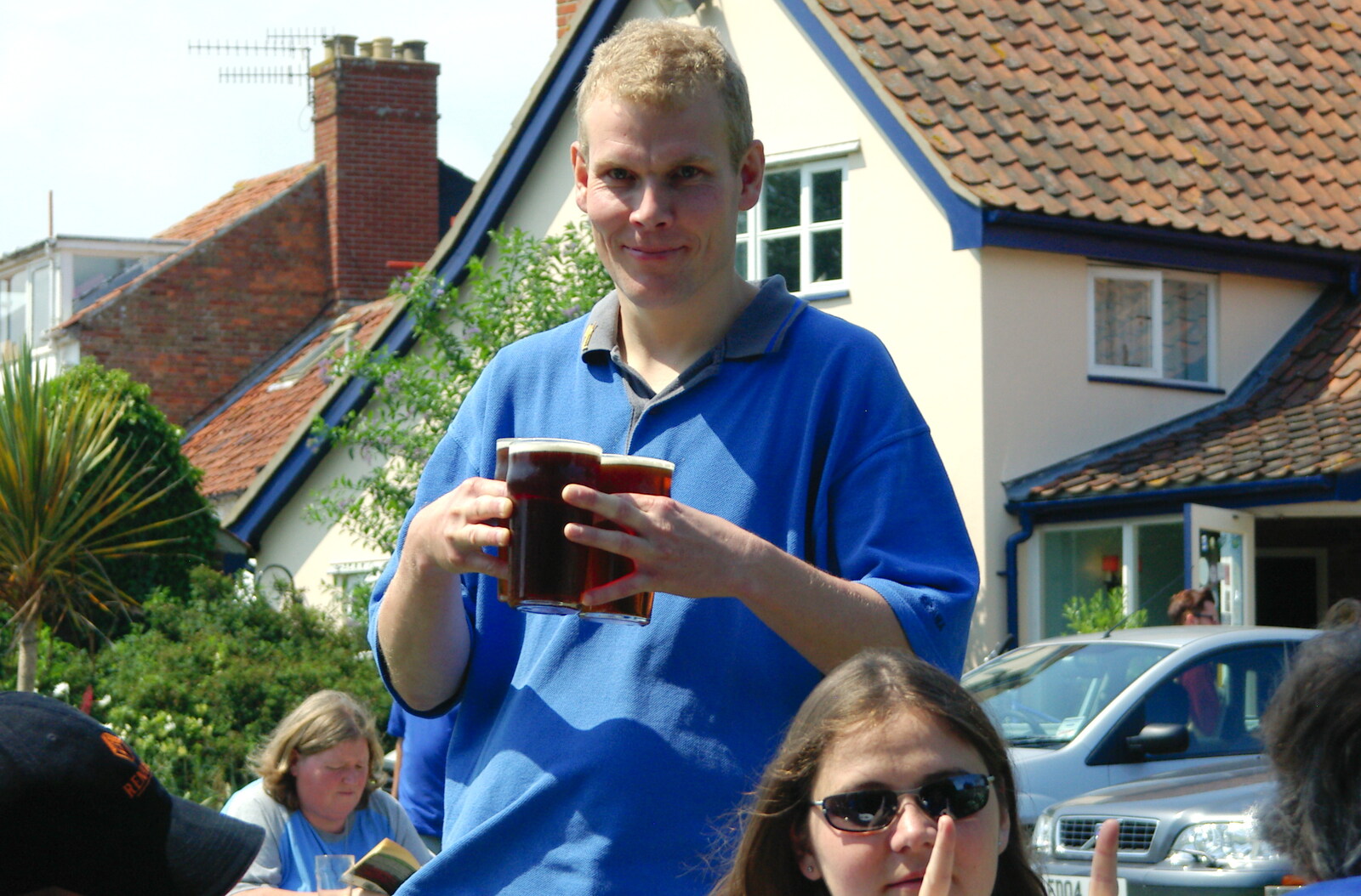 Bill brings some pints back from the bar from The BSCC Charity Bike Ride, Walberswick, Suffolk - 9th July 2005