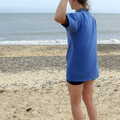 Suey lobs a small stone at the sea, The BSCC Charity Bike Ride, Walberswick, Suffolk - 9th July 2005