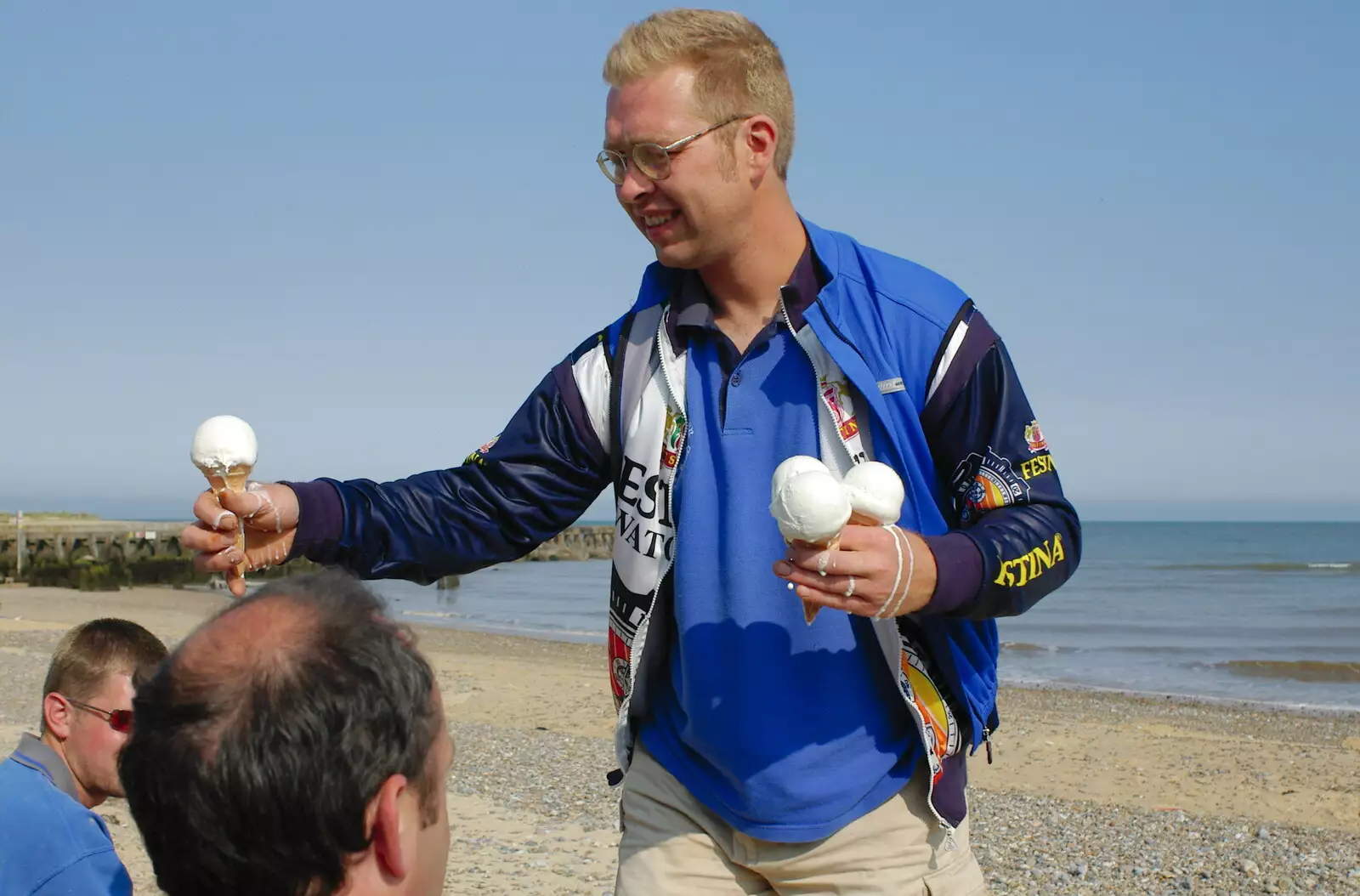 Marc brings more ice creams, from The BSCC Charity Bike Ride, Walberswick, Suffolk - 9th July 2005