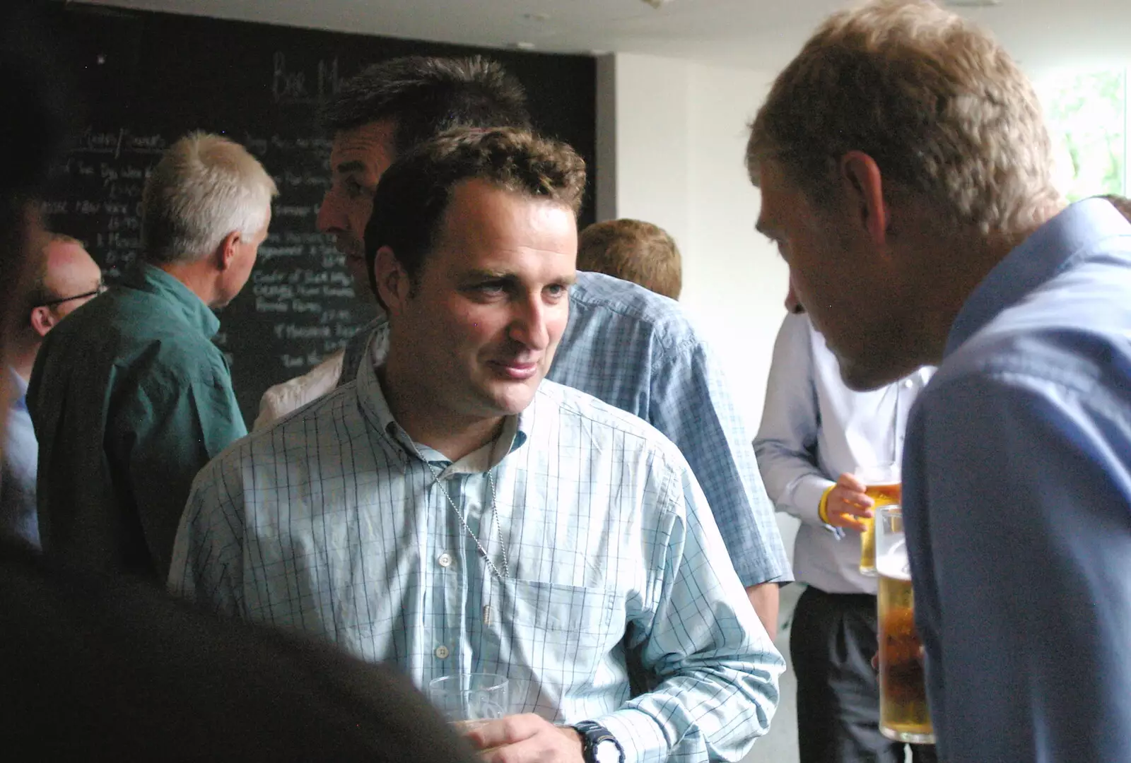 Dan chats to Steve, from Steve Ives' Leaving Lunch, Science Park, Cambridge - 11th July 2005