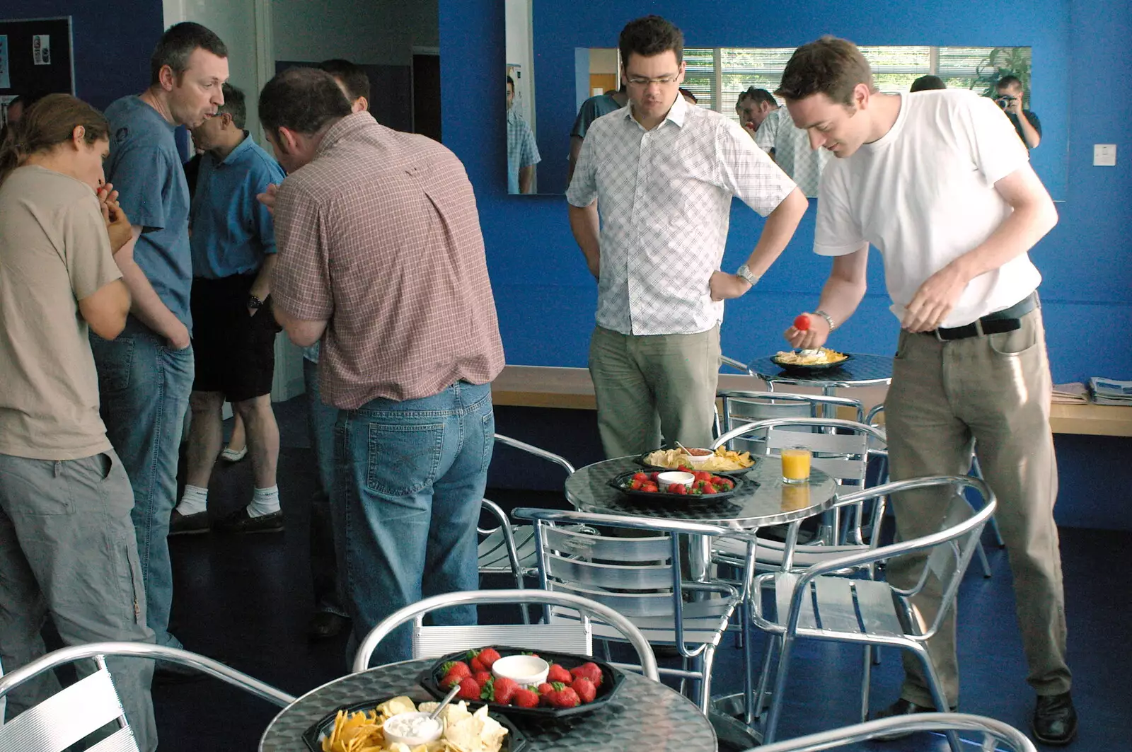 Stef picks a strawberry up, from Steve Ives' Leaving Lunch, Science Park, Cambridge - 11th July 2005