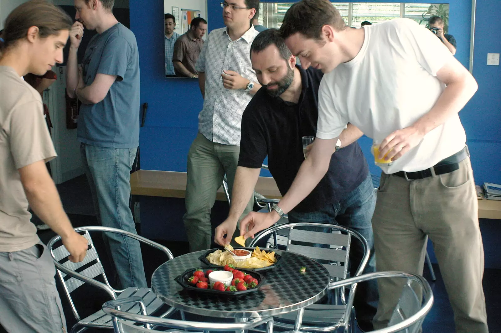 Craig and Stef dig in, from Steve Ives' Leaving Lunch, Science Park, Cambridge - 11th July 2005