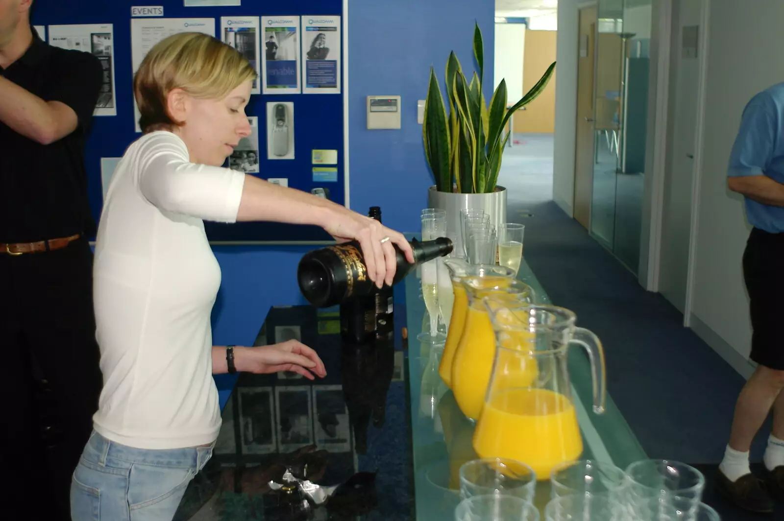 Lucy makes up some more Buck's Fizz, from Steve Ives' Leaving Lunch, Science Park, Cambridge - 11th July 2005