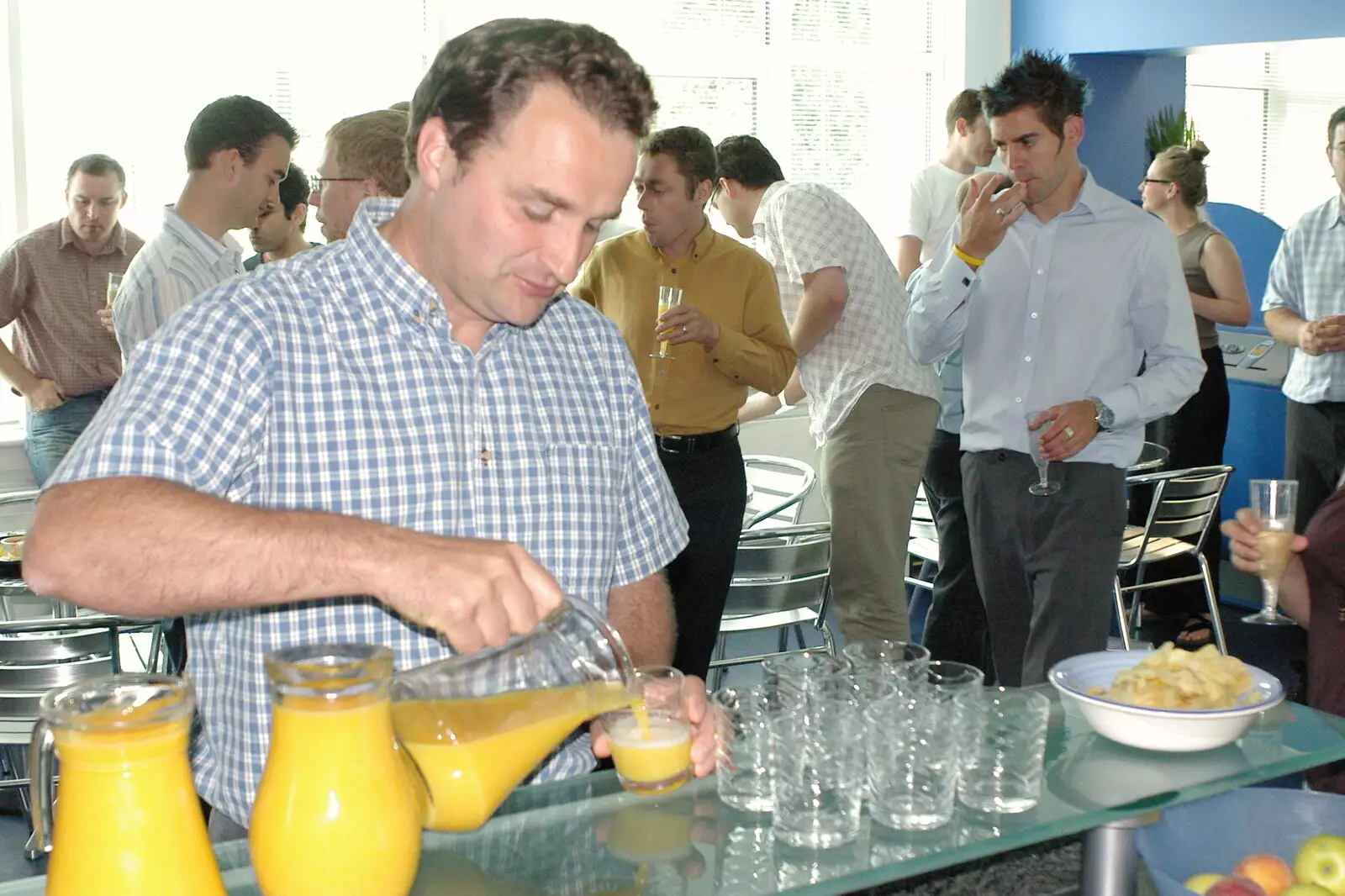 Dan gets some fizz, from Steve Ives' Leaving Lunch, Science Park, Cambridge - 11th July 2005