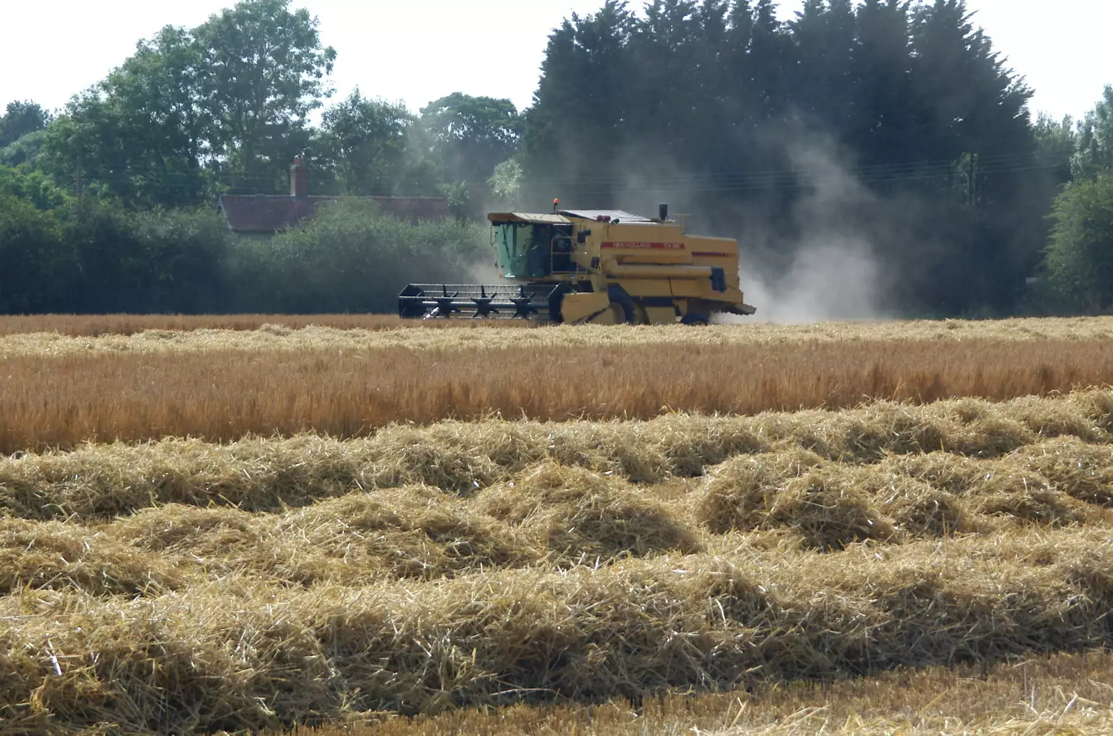 A combine with a trail of dust, from Steve Ives' Leaving Lunch, Science Park, Cambridge - 11th July 2005