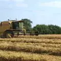 A New Holland trundles around, Steve Ives' Leaving Lunch, Science Park, Cambridge - 11th July 2005