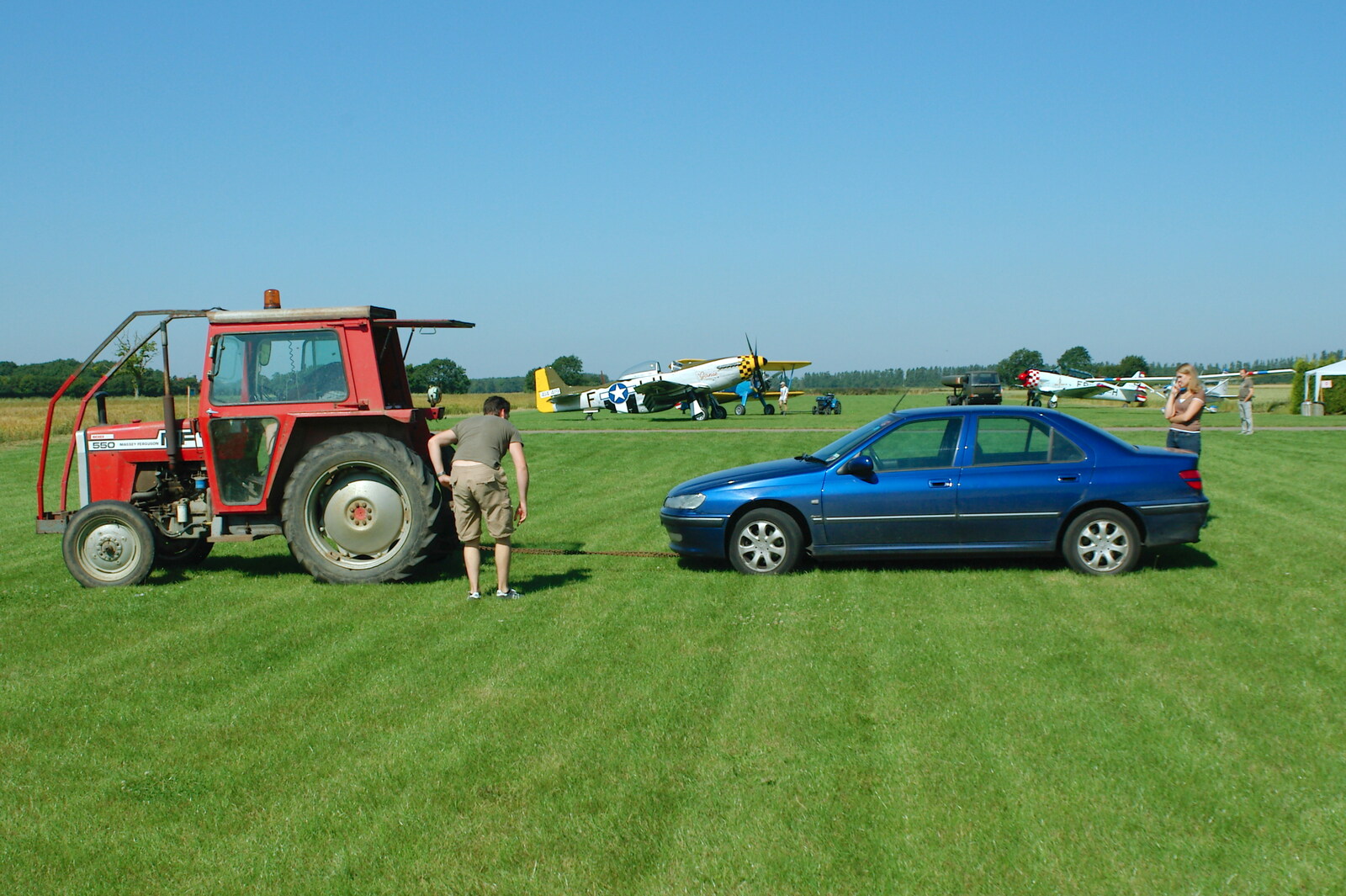 A miscreant 406 is hauled out of the way from A Day With Janie the P-51D Mustang, Hardwick Airfield, Norfolk - 17th July 2005