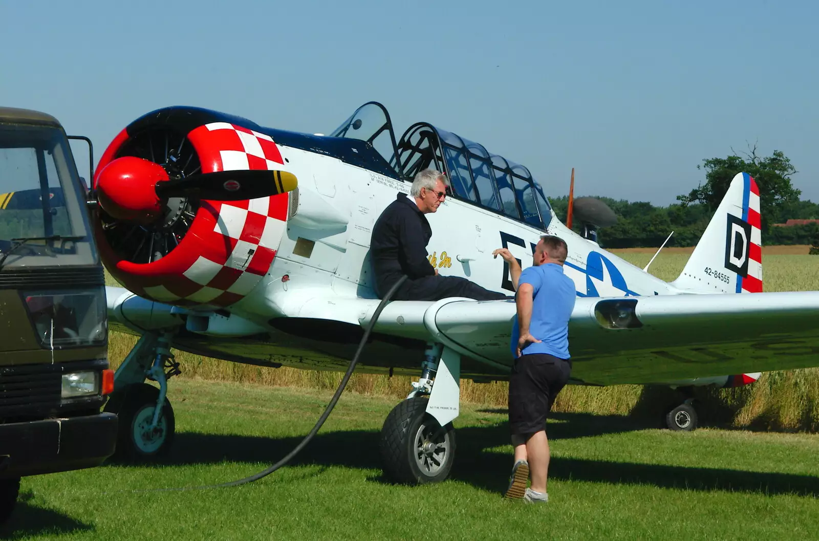 The Harvard is fueled up, from A Day With Janie the P-51D Mustang, Hardwick Airfield, Norfolk - 17th July 2005