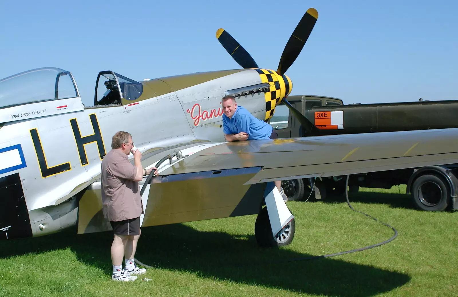 Maurice fuels Janie up, from A Day With Janie the P-51D Mustang, Hardwick Airfield, Norfolk - 17th July 2005