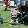 A Day With Janie the P-51D Mustang, Hardwick Airfield, Norfolk - 17th July 2005, Maurice puts the pump back
