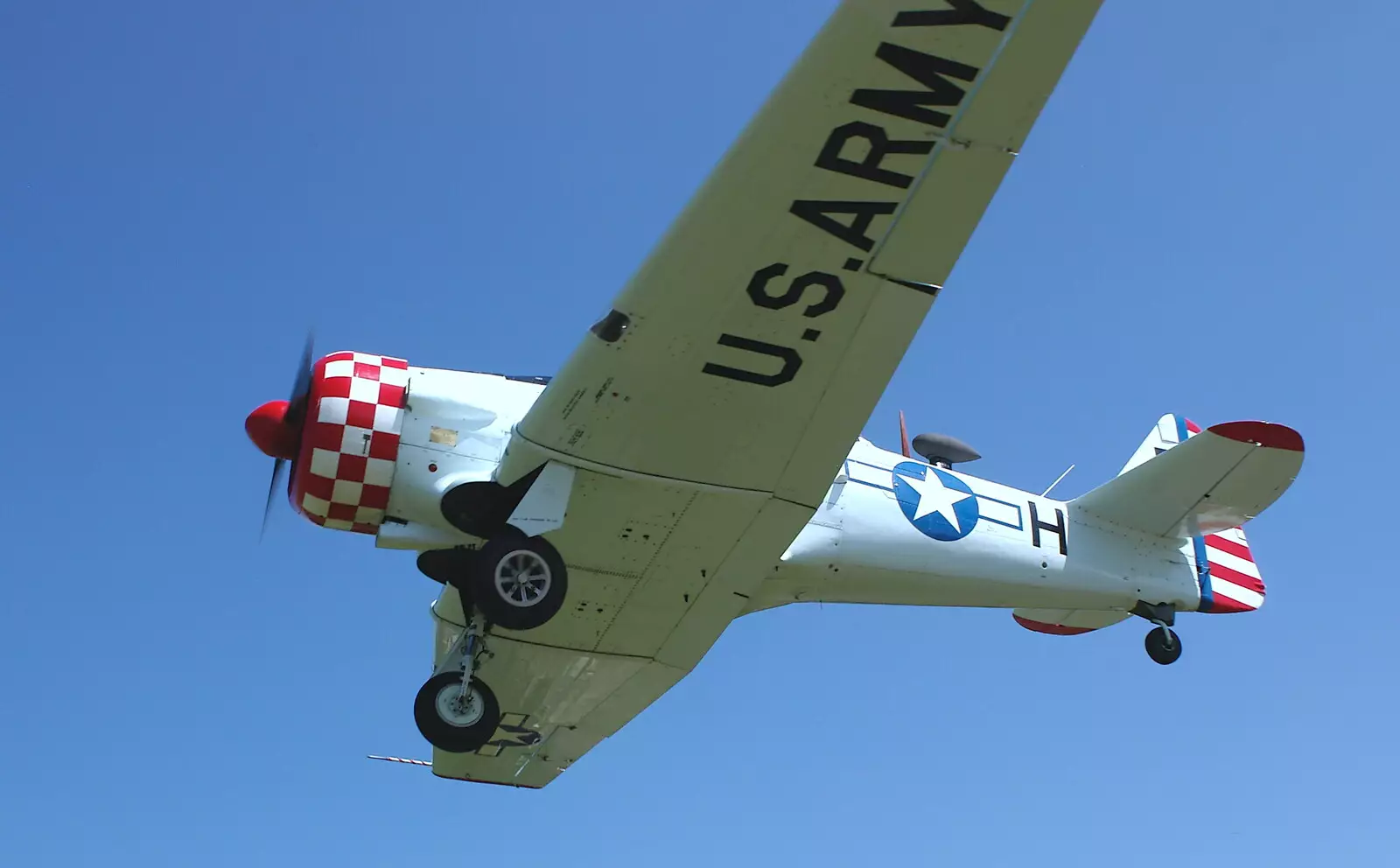 The Harvard is in the air, from A Day With Janie the P-51D Mustang, Hardwick Airfield, Norfolk - 17th July 2005