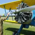 Splattered bugs are cleaned off the Stearman's propeller, A Day With Janie the P-51D Mustang, Hardwick Airfield, Norfolk - 17th July 2005