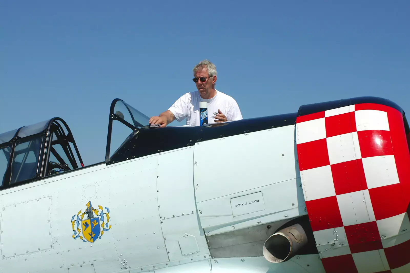 The Harvard gets a windscreen clean, from A Day With Janie the P-51D Mustang, Hardwick Airfield, Norfolk - 17th July 2005