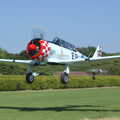 The Harvard takes off to do Thurston airshow, A Day With Janie the P-51D Mustang, Hardwick Airfield, Norfolk - 17th July 2005