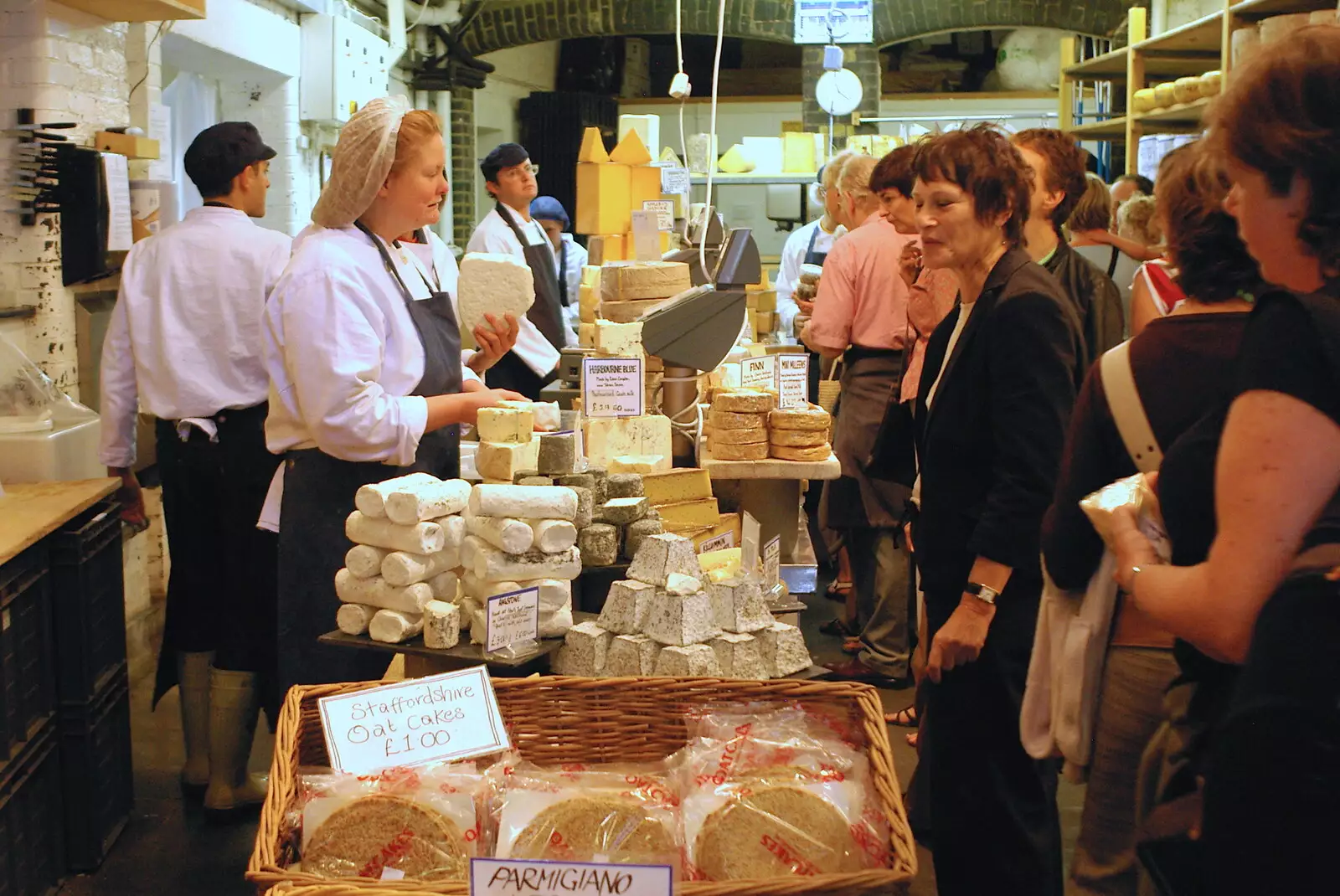 Neals Yard Dairy, a great but heaving cheese shop, from Borough Market and North Clapham Tapas, London - 23rd July 2005