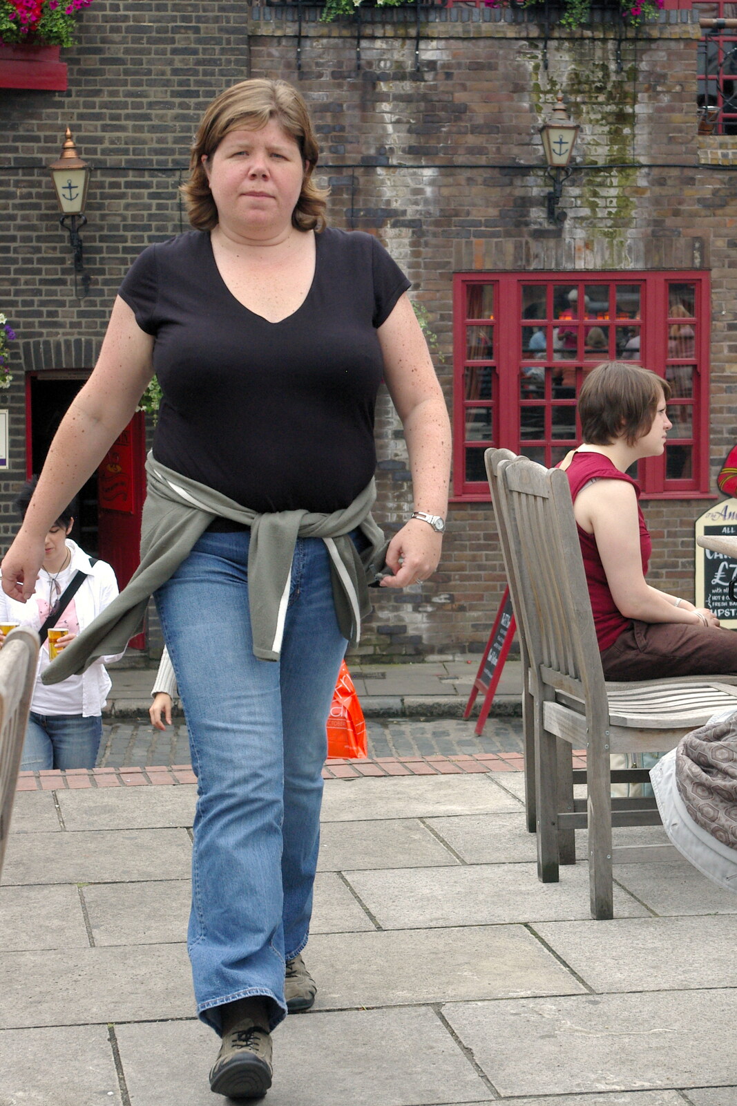Sis strides purposefully back from the pub from Borough Market and North Clapham Tapas, London - 23rd July 2005