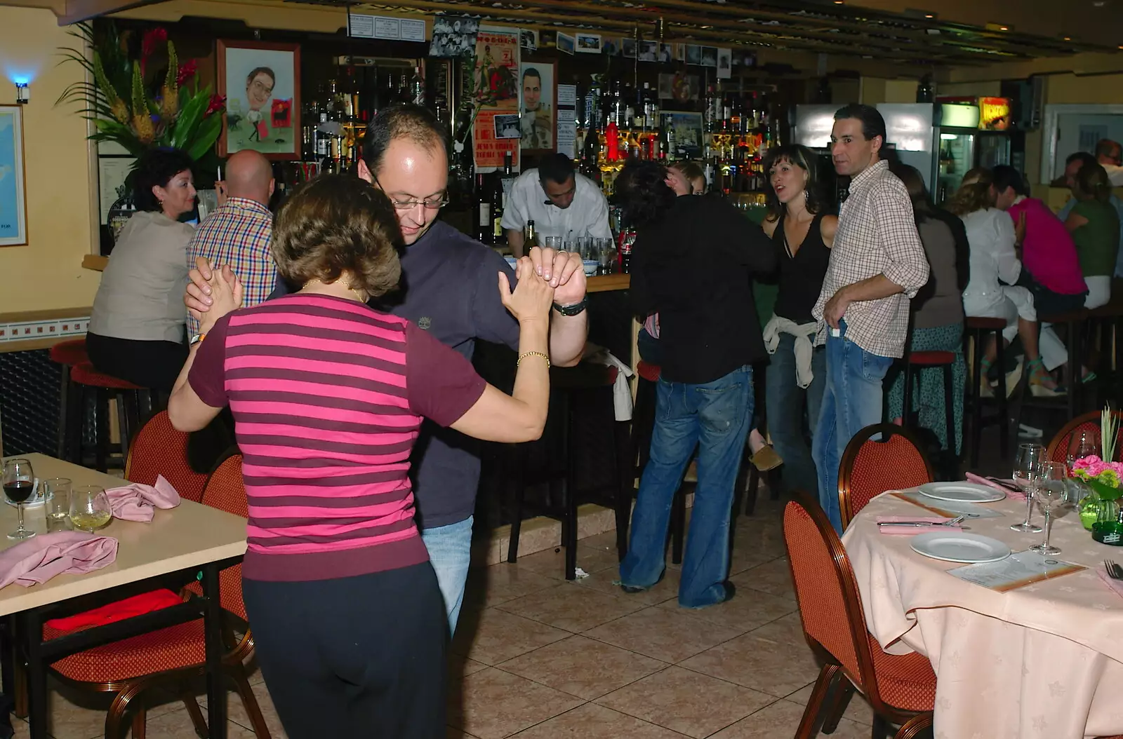 Matt dances with a Columbian woman, from Borough Market and North Clapham Tapas, London - 23rd July 2005