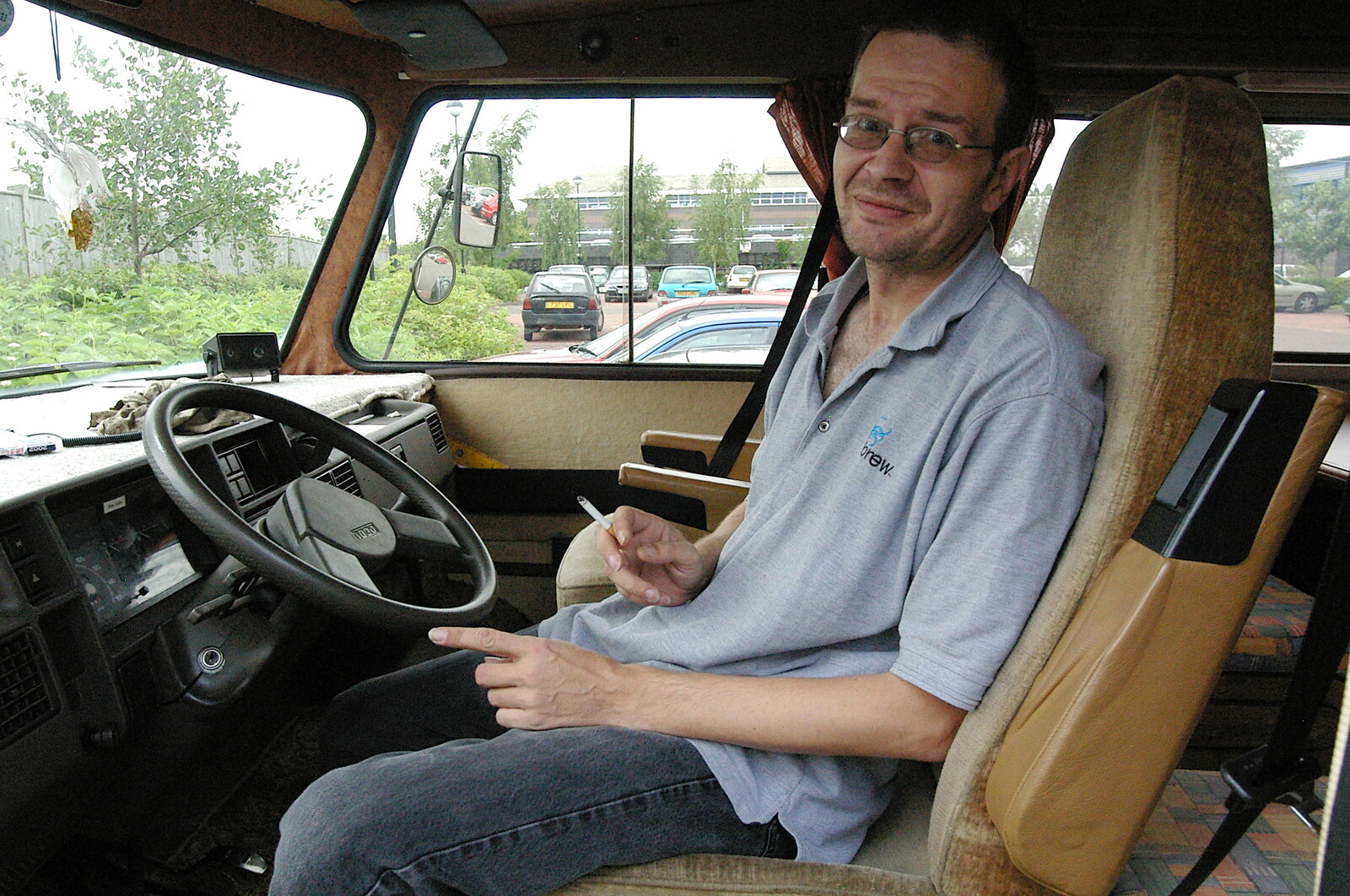 Richard in the driver's seat from Richard Panton's Van and Alex Hill at Revolution Records, Diss and Cambridge - 29th July 2005