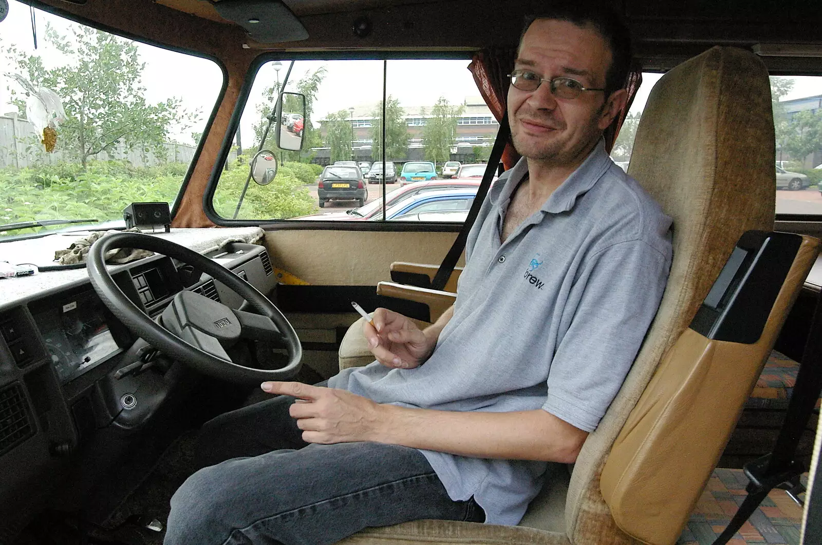 Richard in the driver's seat, from Richard Panton's Van and Alex Hill at Revolution Records, Diss and Cambridge - 29th July 2005