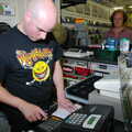 Mark on the till, Richard Panton's Van and Alex Hill at Revolution Records, Diss and Cambridge - 29th July 2005