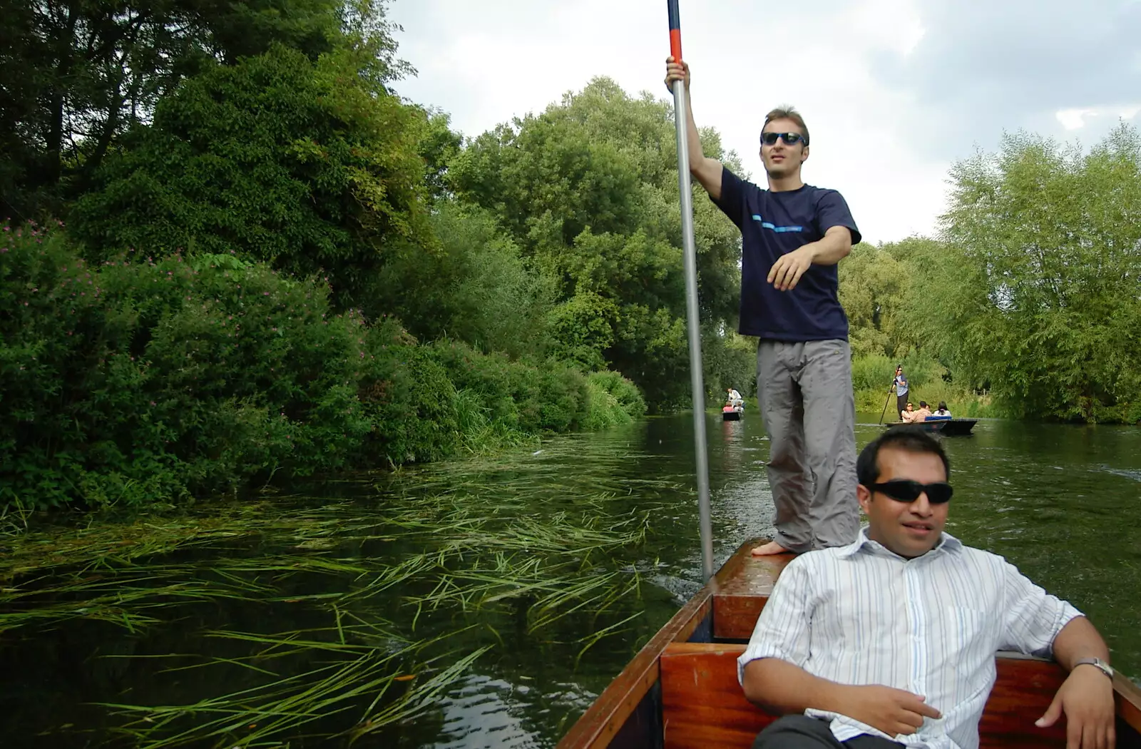 Ben surveys the scene in the water weeds, from Qualcomm goes Punting on the Cam, Grantchester Meadows, Cambridge - 18th August 2005