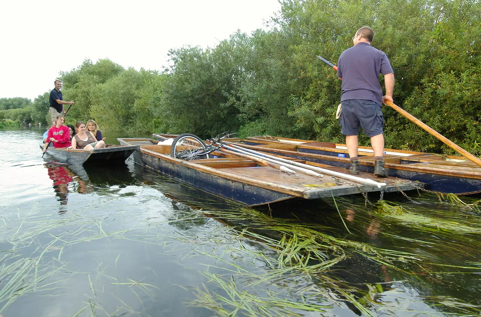 Nick tangles up with a punt convoy, from Qualcomm goes Punting on the Cam, Grantchester Meadows, Cambridge - 18th August 2005