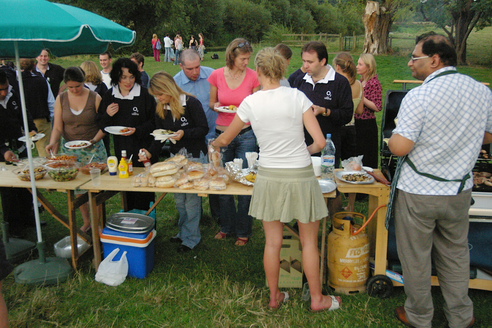Food is served from Qualcomm goes Punting on the Cam, Grantchester Meadows, Cambridge - 18th August 2005